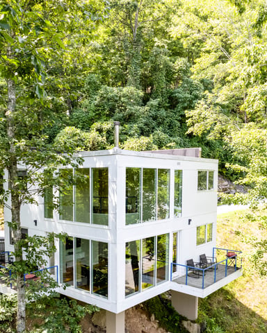 cube house with floor to ceiling windows